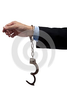 Business man arm in handcuffs