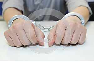 Business man arrested with handcuffs
