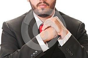 Business man with beard, black suit and red tie