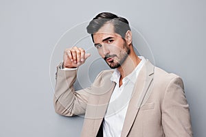 business man beige success smiling copyspace suit handsome happy businessman portrait