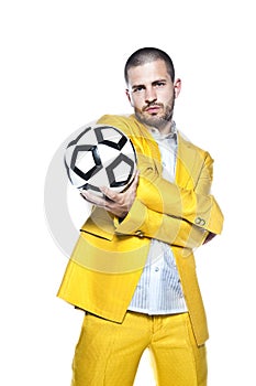 Businessman is a big fotball fanbusinessman squeezes ball, isolated on the white background photo