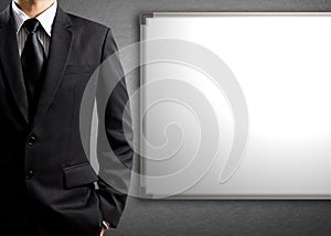 Business man and blank white board