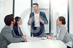 Business, man and boardroom with meeting for teamwork, collaboration and feedback on company growth as leader. Ceo, boss