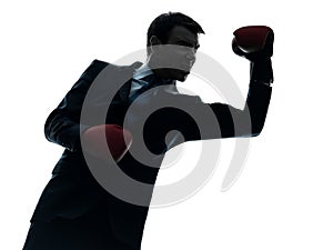 Business man boxer with boxing gloves silhouette