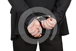 Business man breaking handcuffs