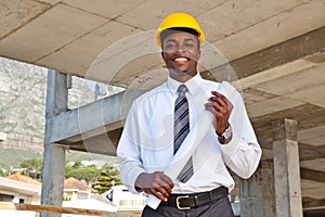 Business man in building site