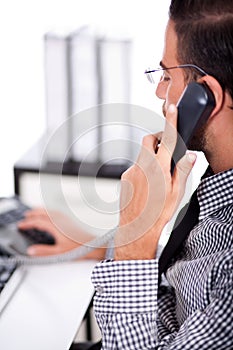 Business man busy with his telephone