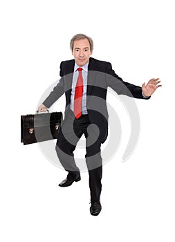 Business man carrying a briefcase