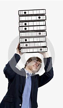 Business man carrying folders