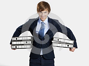 Business man carrying folders