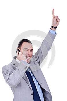 Business man with cellular phone winning