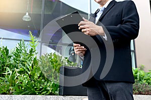 business man chairman front of office building