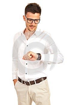 Business man checking wristwatch