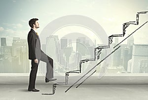 Business man climbing up on hand drawn staircase concept