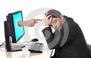 Business man with computer in stress concept