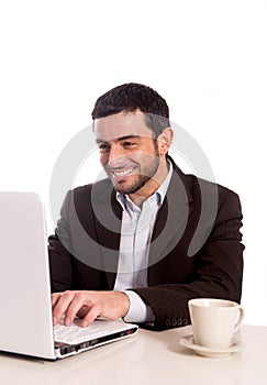 Business man concentrating on a laptop photo