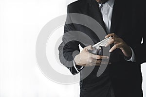 business man counting banknote on white background