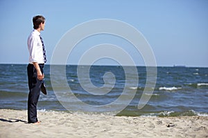 business man dealing with emotional stress at the sea
