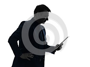 Business man digital tablet smiling silhouette