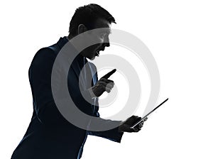 Business man digital tablet surisped shocked silhouette