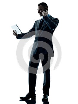 Business man digital tablet telephone isolated