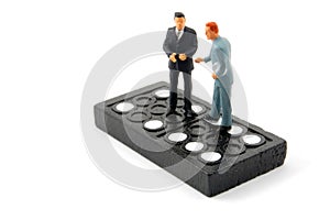 Business man on domino isolated