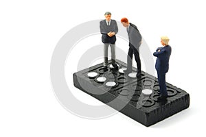 Business man on domino isolated