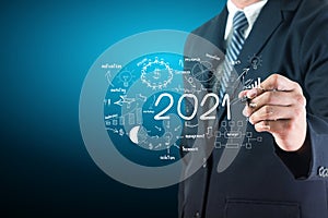 Business man drawing new year 2021 charts graphs business success strategy plan