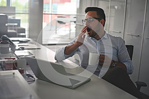 Business man dreaming on office desk. Business man in office