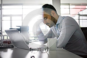 Business man dreaming on office desk. Business man in office.