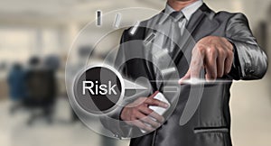 Business man examining risk