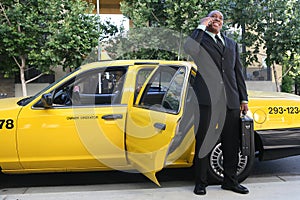 Business Man Exiting Taxi