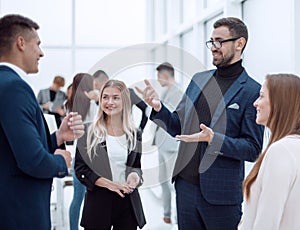 business man explaining something to his colleague.