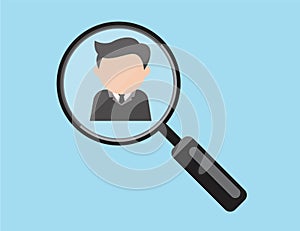 Business man in the frame of magnifying glass as he realize to be chosen or selected. photo