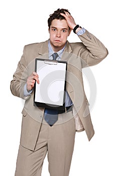 Business man in frustration showing blank paper