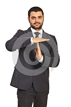 Business man gesture time out