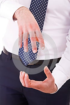 Businessman gesturing with both hands. photo