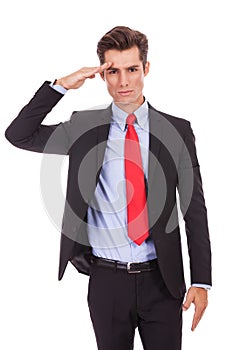 Business man gives military salute