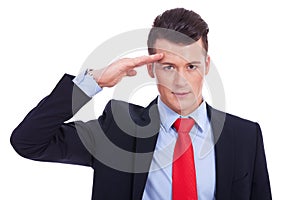 Business man gives salute