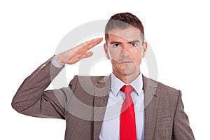 Business man gives salute