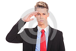 Business man gives salute