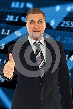 Business man gives thumbs