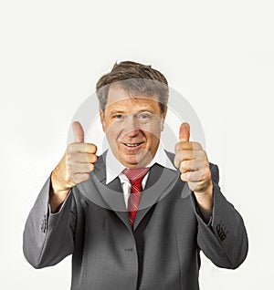 Business man giving thumbs up sign