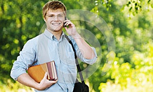 Business man glasses books phone