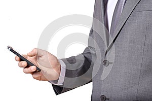 Business man in grey suit texting