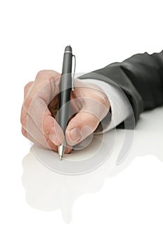 Business man hand holding a pen