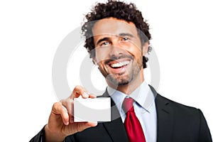 Business man handing a blank business card