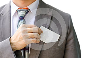 Business man handing a blank business card