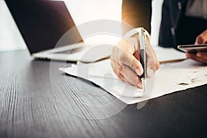 business man hands busy using cell phone at office desk