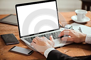 Business man hands typing on laptop pc